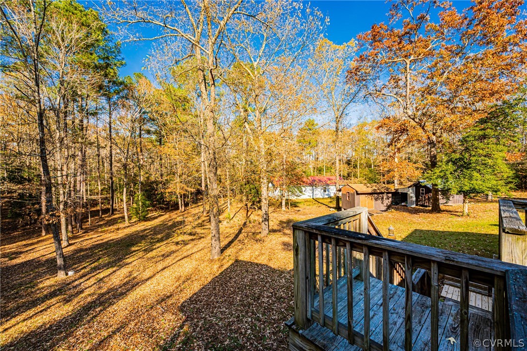 4612 Tatum Road Disputanta, VA 23842 - Photo 40 of 50 a view of a balcony with two chairs
