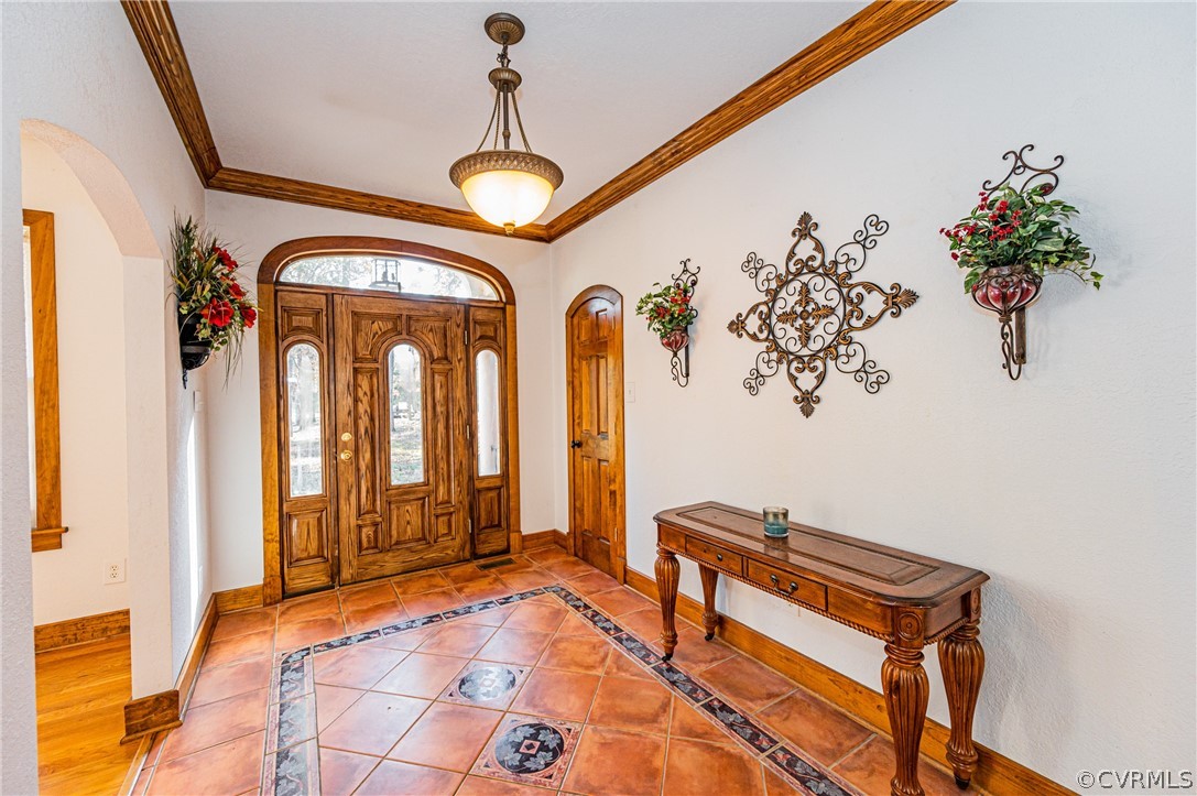 4612 Tatum Road Disputanta, VA 23842 - Photo 4 of 50 a view of an entryway with a chandelier