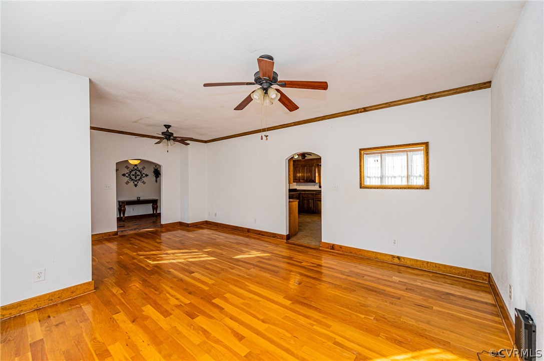 4612 Tatum Road Disputanta, VA 23842 - Photo 9 of 50 a view of a room with a hanging light and hardwood
