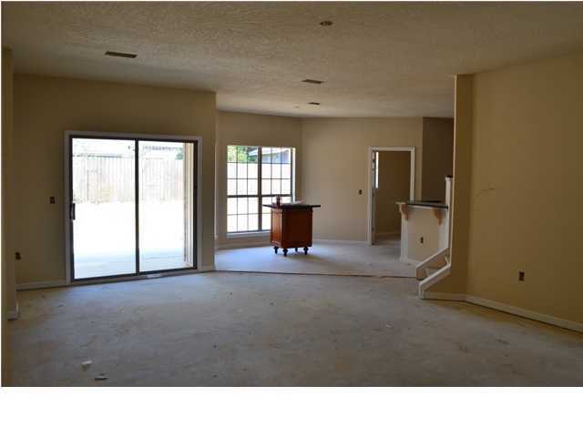 4584 Hermosa Road Crestview, FL 32539 - Photo 7 of 12 a open hall with a window