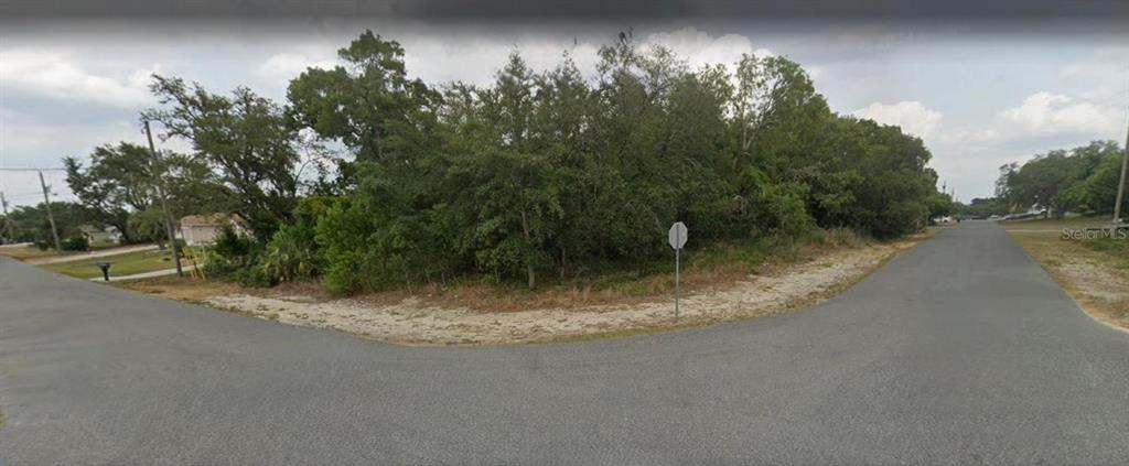 10381 Clarion Street Spring Hill, FL 34608 - Photo 1 of 2 a view of a street view