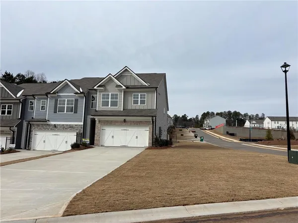 a view of a house with a ocean view