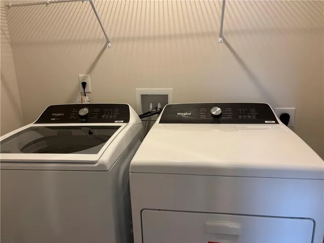 a close view of a sink and a stove in a kitchen