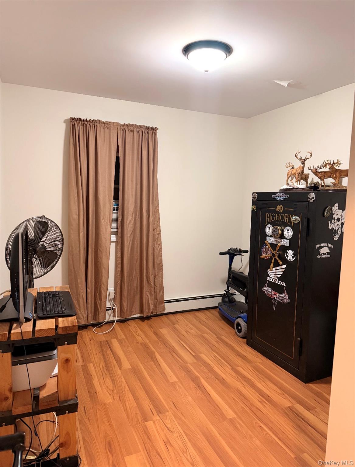 71 Crescent Street Yaphank, NY 11980 - Photo 12 of 22 a view of a room with gym equipment