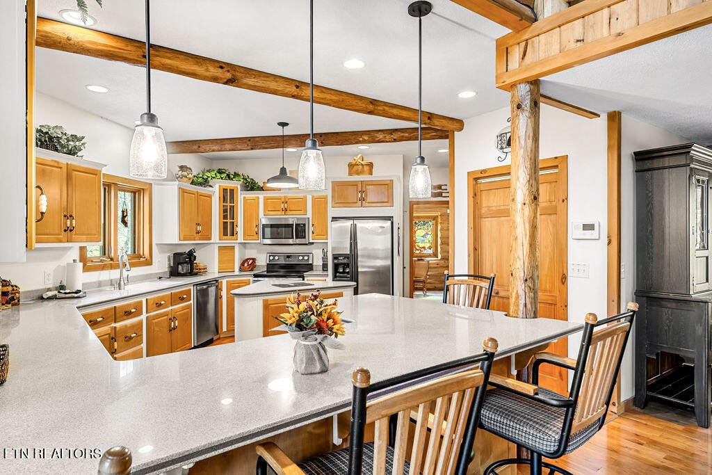 206 Cobblestone Way Townsend, TN 37882 - Photo 15 of 50 a large kitchen with a table and chairs