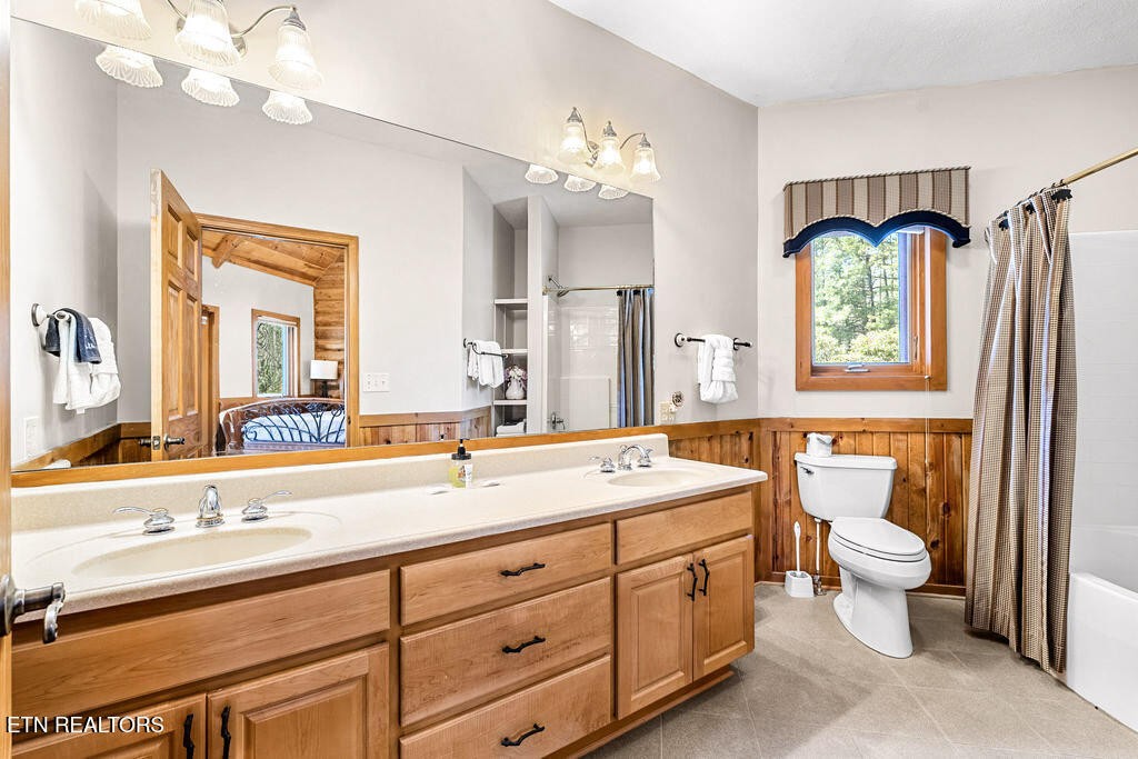 206 Cobblestone Way Townsend, TN 37882 - Photo 21 of 50 a bathroom with a double vanity sink mirror and toilet
