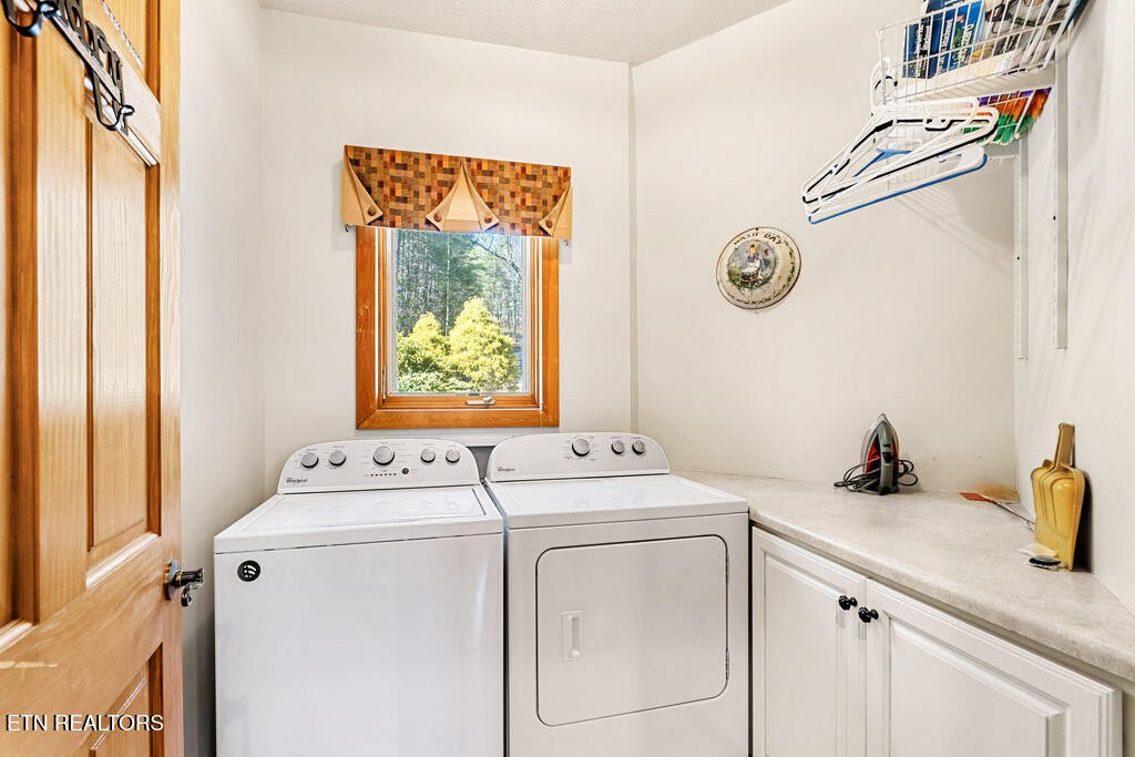 206 Cobblestone Way Townsend, TN 37882 - Photo 23 of 50 a utility room with dryer and washer