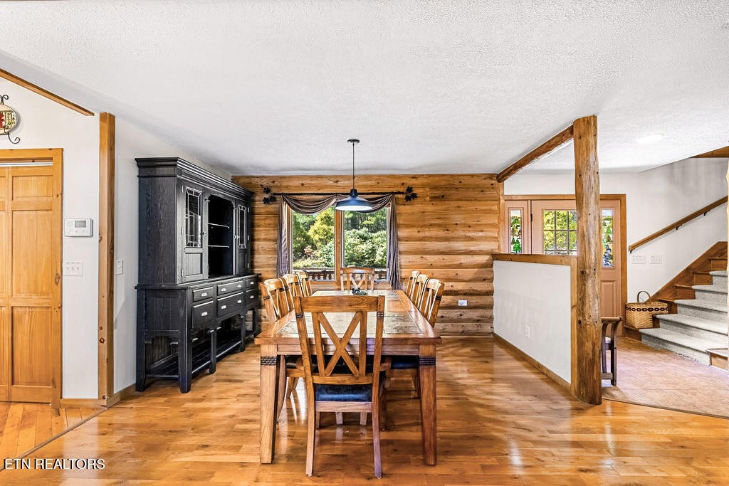 206 Cobblestone Way Townsend, TN 37882 - Photo 8 of 50 a view of a dining room with furniture window and wooden floor