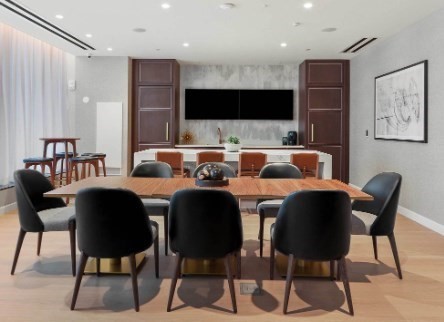 390 Harrison Avenue, Unit 814 Boston, MA 02118 - Photo 12 of 14 a view of a dining room with furniture