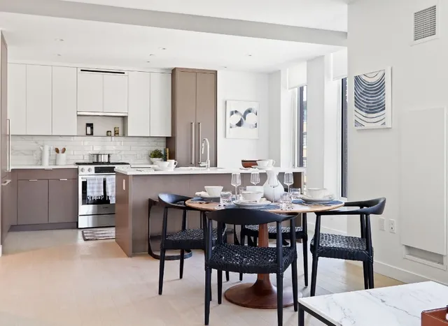 a view of a dining room with furniture