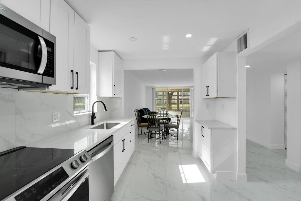 8321 Sands Point Boulevard, Unit 101D Tamarac, FL 33321 - Photo 4 of 18 Photo 4