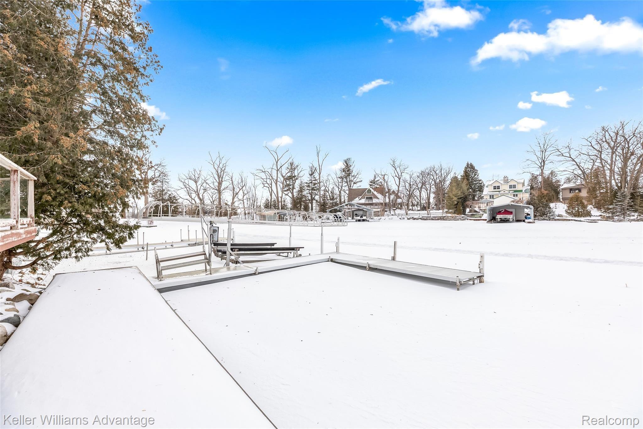 3191 Ridge Road White Lake, MI 48383 - Photo 15 of 42 New synthetic boardwalk at lake shore.