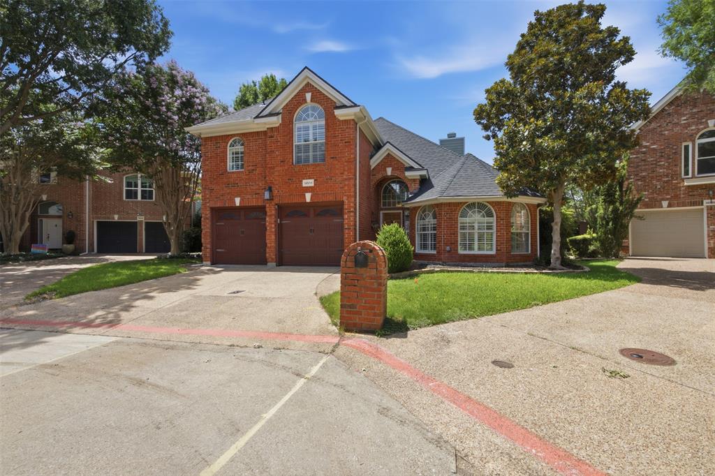 14584 Blueberry Court Addison, TX 75001 - Photo 5 of 40 front view of a house with a yard