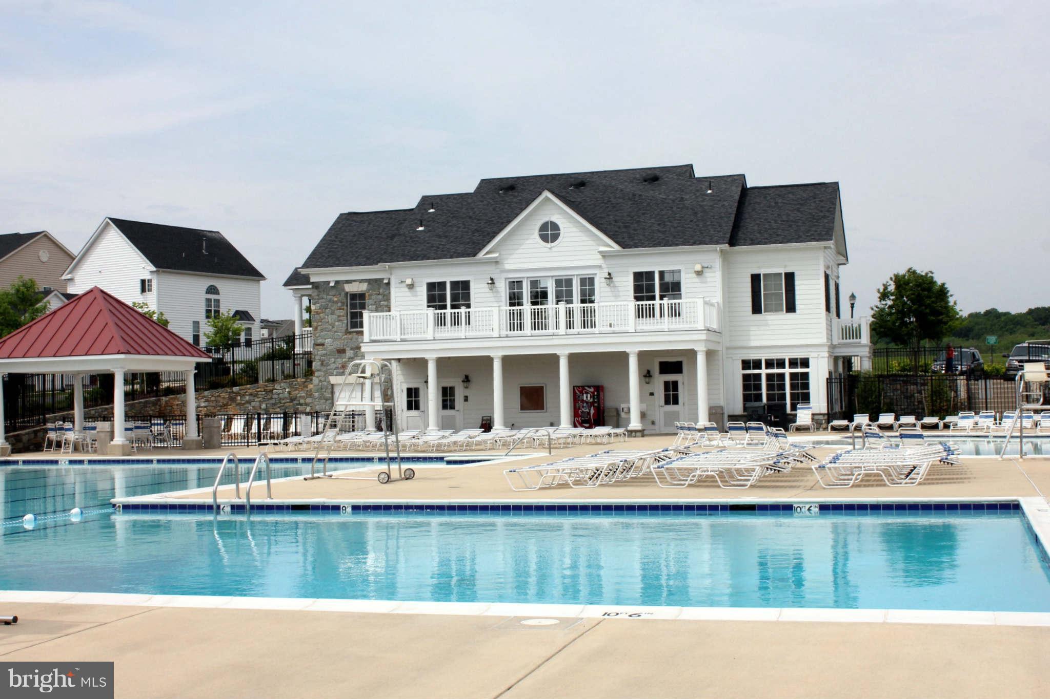 22509 Castle Oak Road Clarksburg, MD 20871 - Photo 4 of 7 a swimming pool view with a outdoor space