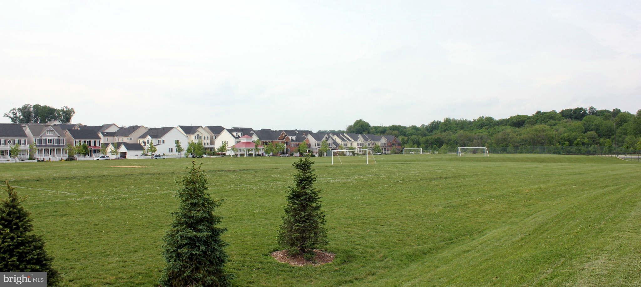 22509 Castle Oak Road Clarksburg, MD 20871 - Photo 6 of 7 a view of a green field with clear sky