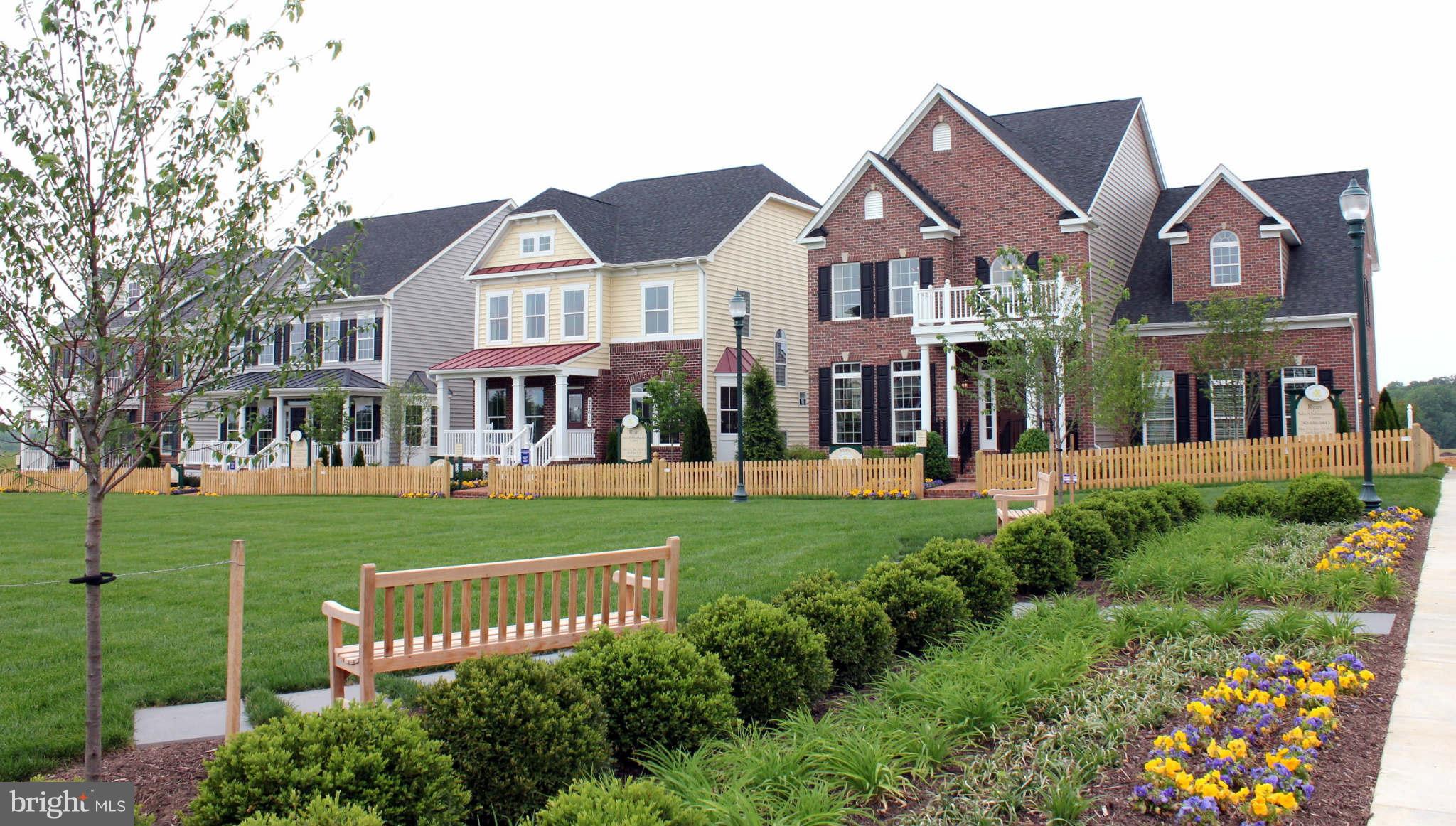 22509 Castle Oak Road Clarksburg, MD 20871 - Photo 7 of 7 a front view of a residential houses with yard and green space