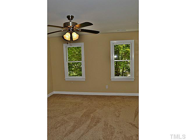 8920 New Windsor Place Raleigh, NC 27603 - Photo 13 of 25 a view of an entryway with a window