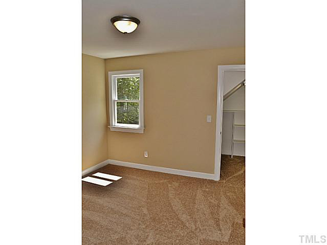 8920 New Windsor Place Raleigh, NC 27603 - Photo 16 of 25 a view of a room with window