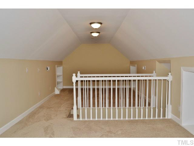 8920 New Windsor Place Raleigh, NC 27603 - Photo 20 of 25 a view of a livingroom with furniture and wooden floor