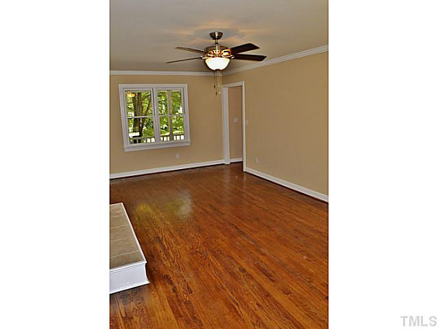 8920 New Windsor Place Raleigh, NC 27603 - Photo 6 of 25 a view of an entryway with wooden floor