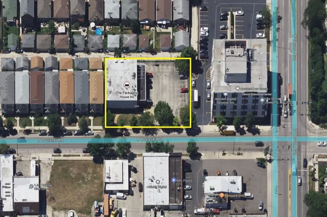 a aerial view of multi story residential apartment building