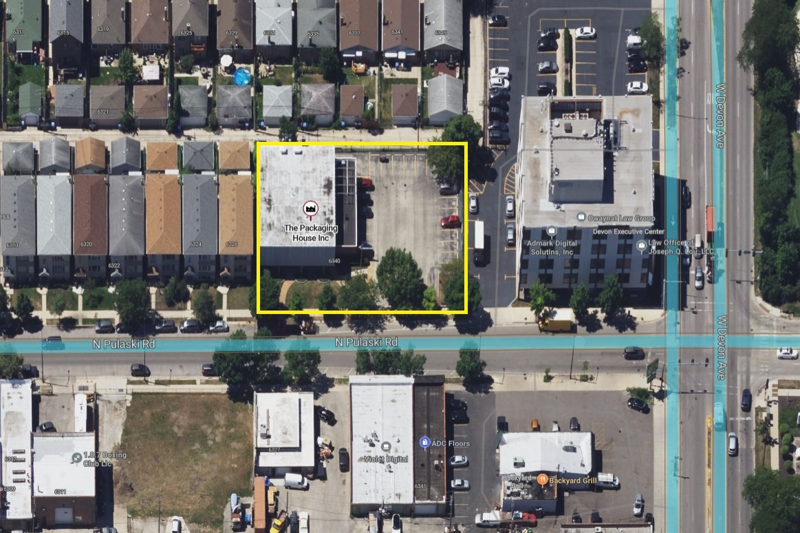 a aerial view of multi story residential apartment building