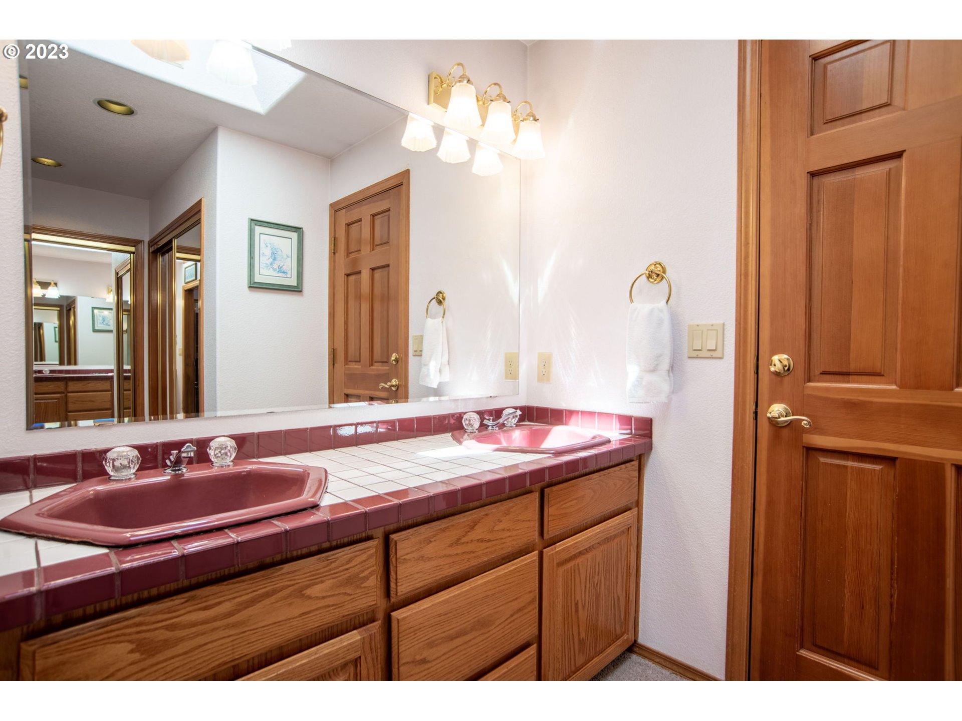 760 Northeast 24th Street Gresham, OR 97030 - Photo 18 of 34 a bathroom with a sink and a mirror