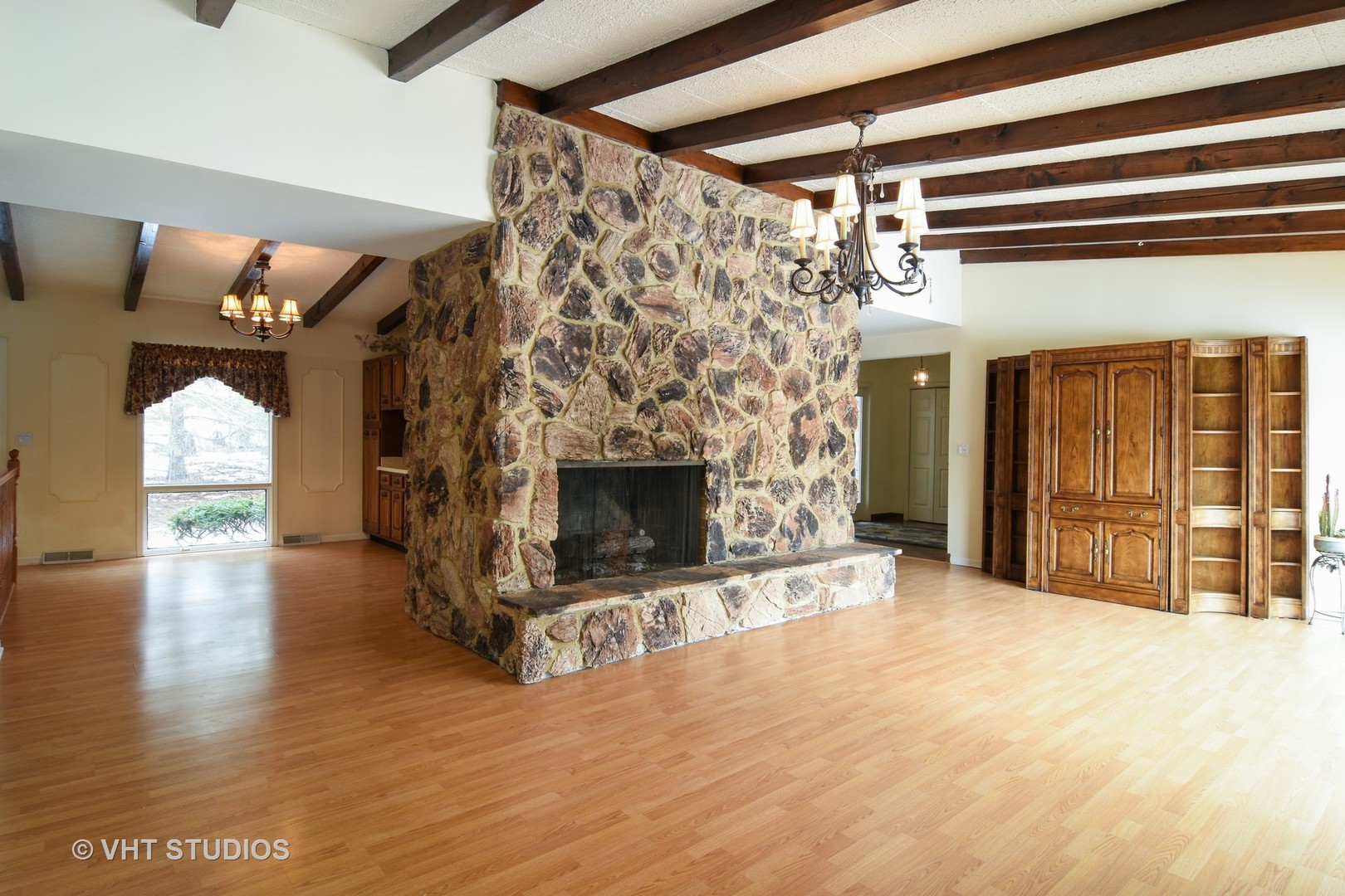 21098 North Valley Road Kildeer, IL 60047 - Photo 2 of 16 a view of a livingroom with a fireplace and window