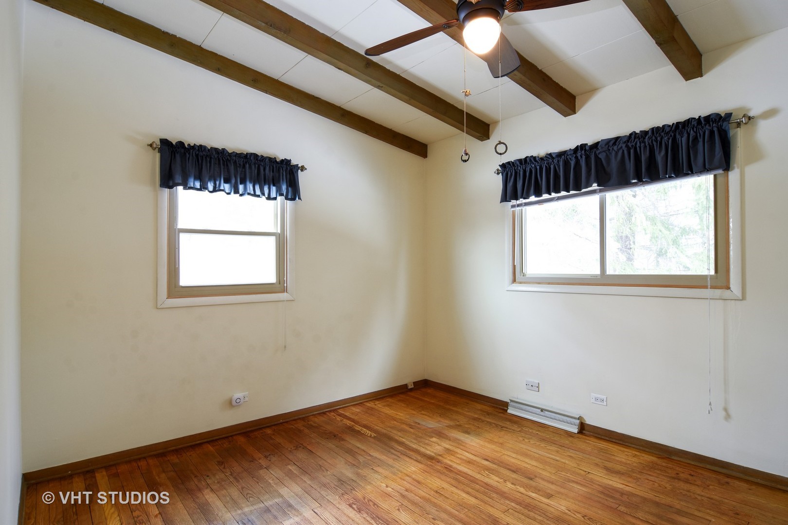 21098 North Valley Road Kildeer, IL 60047 - Photo 10 of 16 a view of an empty room with wooden floor and a window