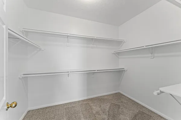 a view of an empty walk in closet