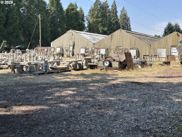 a view of a back yard of the house