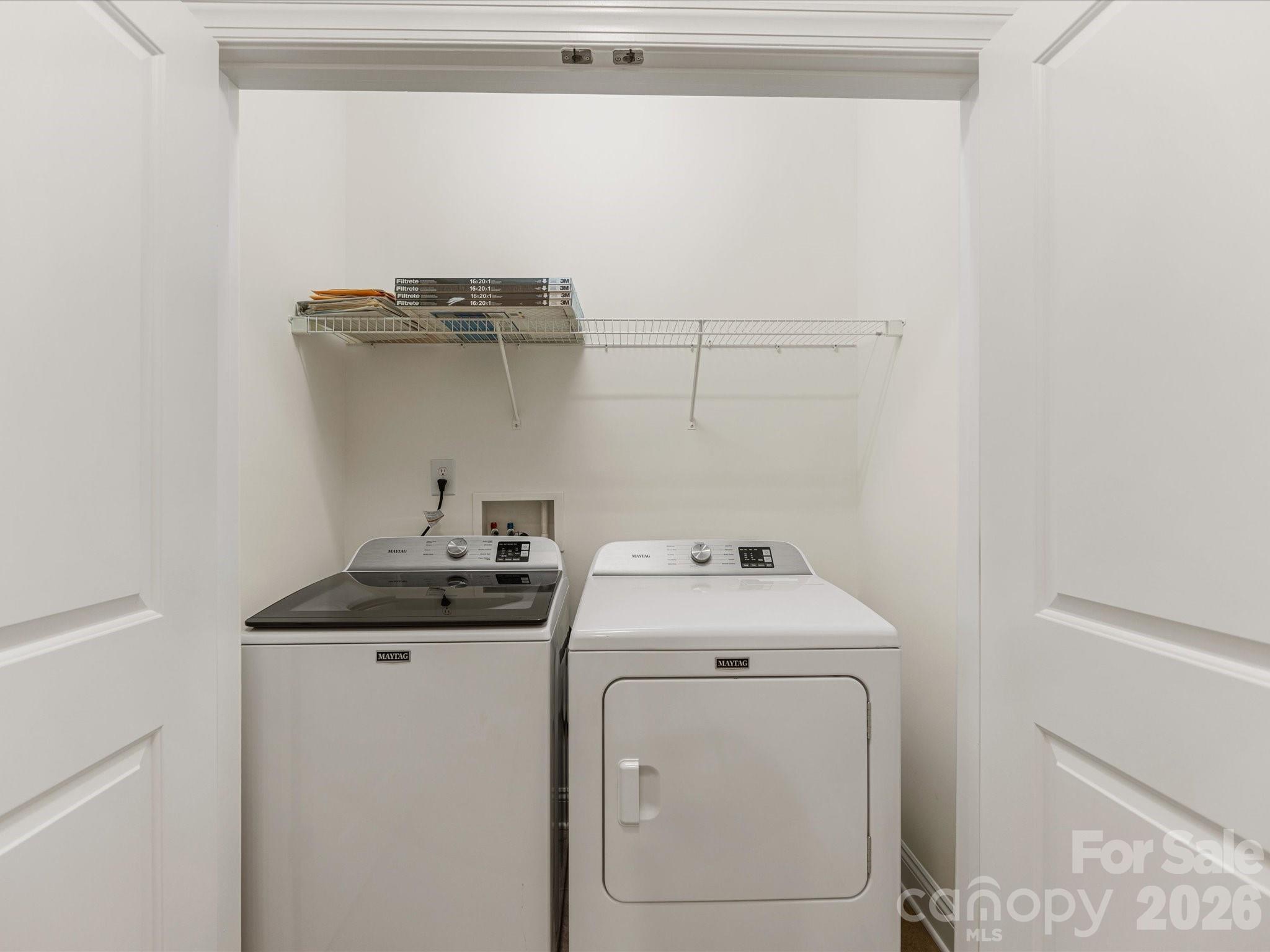 2963 Bellasera Way Matthews, NC 28105 - Photo 18 of 45 a utility room with dryer and washer