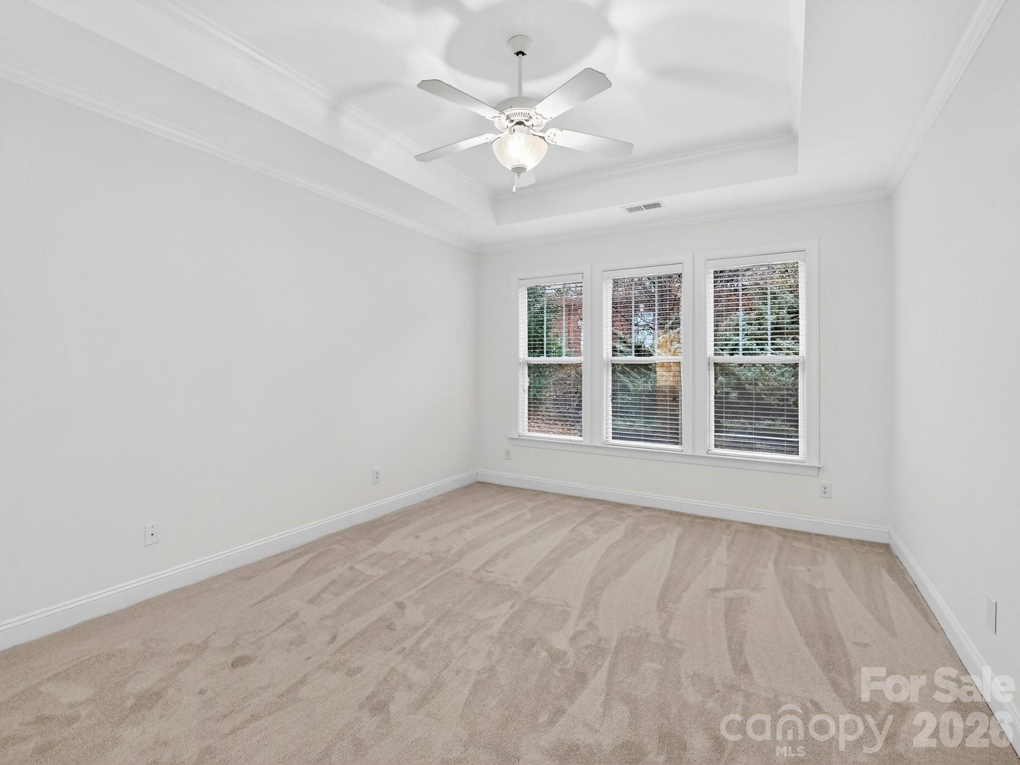 2963 Bellasera Way Matthews, NC 28105 - Photo 23 of 45 a view of an empty room with a window