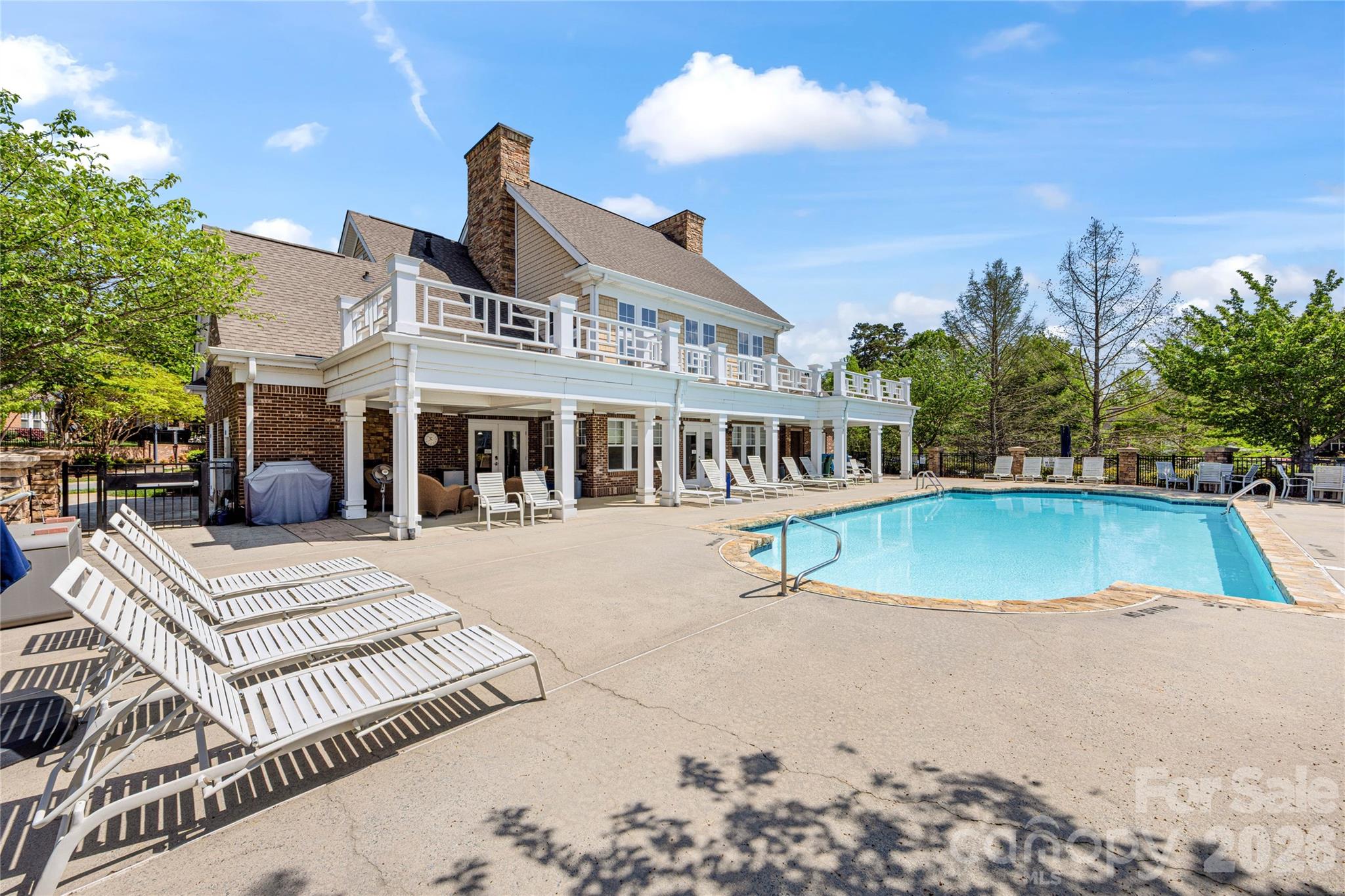 2963 Bellasera Way Matthews, NC 28105 - Photo 40 of 45 a view of a house with swimming pool and sitting area