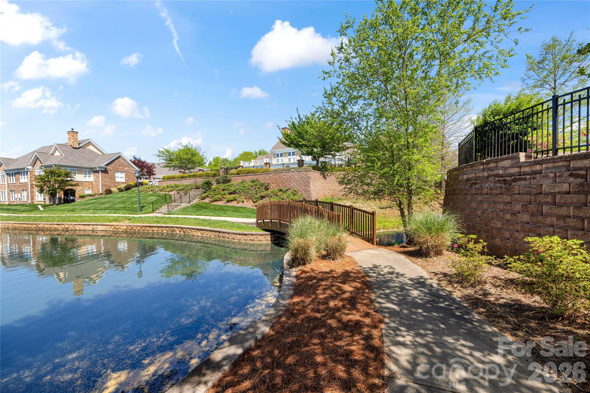 2963 Bellasera Way Matthews, NC 28105 - Photo 43 of 45 a front view of a house with a yard