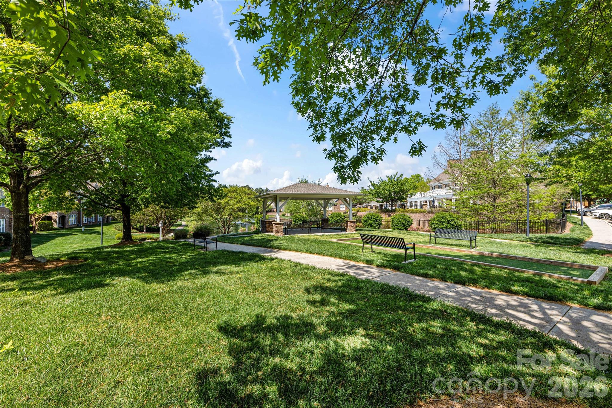 2963 Bellasera Way Matthews, NC 28105 - Photo 44 of 45 a view of a park with houses a park