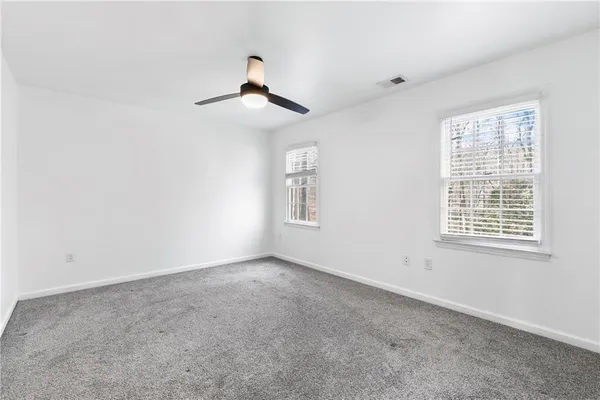 an empty room with windows