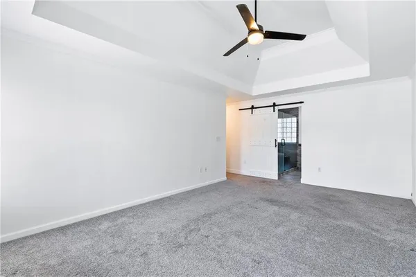 an empty room with fan