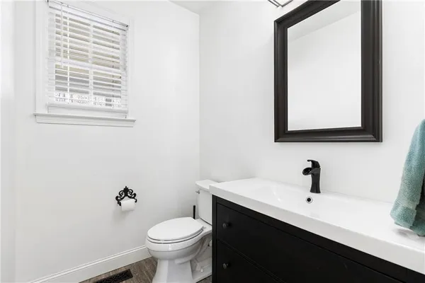 a bathroom with a sink and a toilet