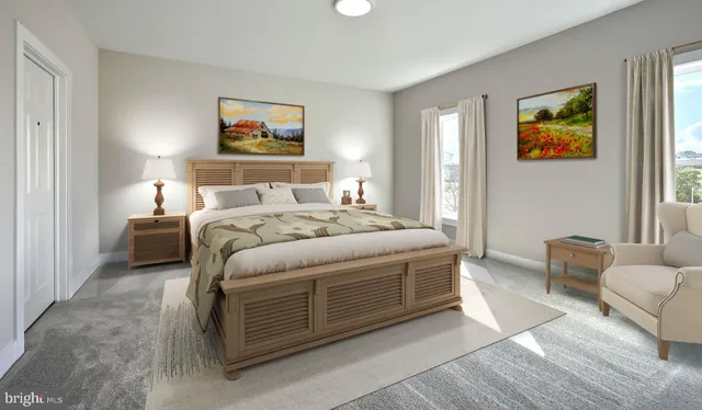 a bedroom with a bed and a couch