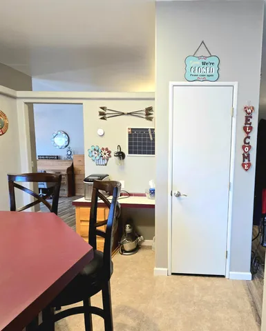 a view of a livingroom with furniture and window