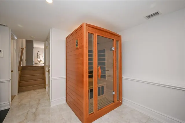 a view of workspace with wooden floor windows