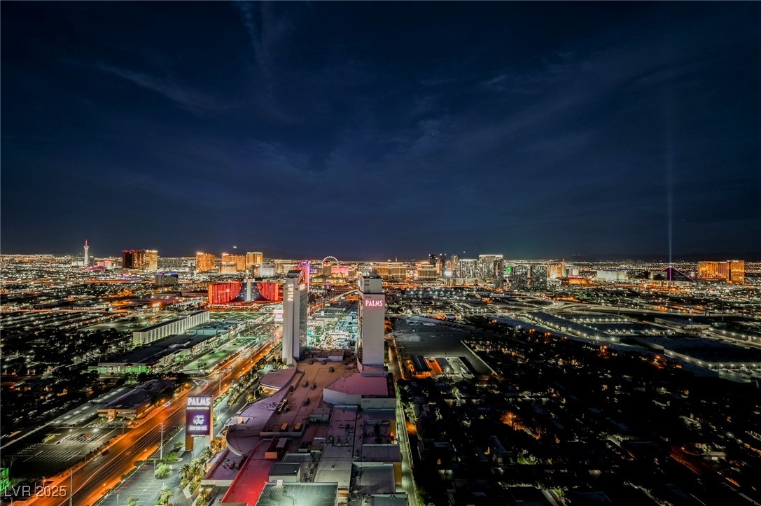 4381 West Flamingo Road, Unit 5708 Las Vegas, NV 89103 - Photo 3 of 34 Balcony with jacuzzi overlooking the Las Vegas Strip