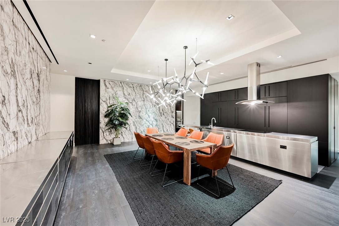 4381 West Flamingo Road, Unit 5708 Las Vegas, NV 89103 - Photo 9 of 34 Dining area with accent walls. Remodeled kitchen