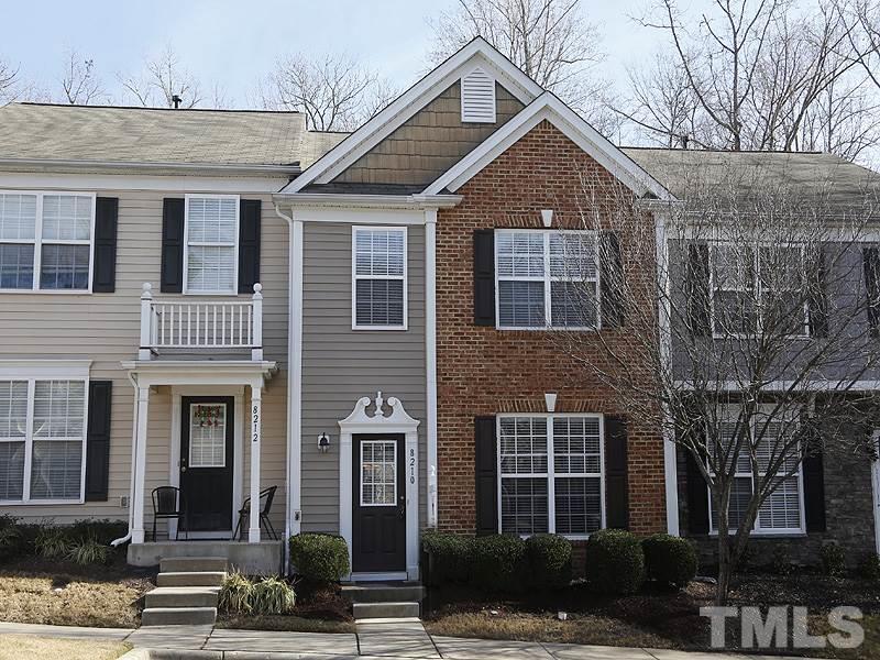 8210 Clasara Circle Raleigh, NC 27613 - Photo 1 of 14 a front view of a house with glass windows