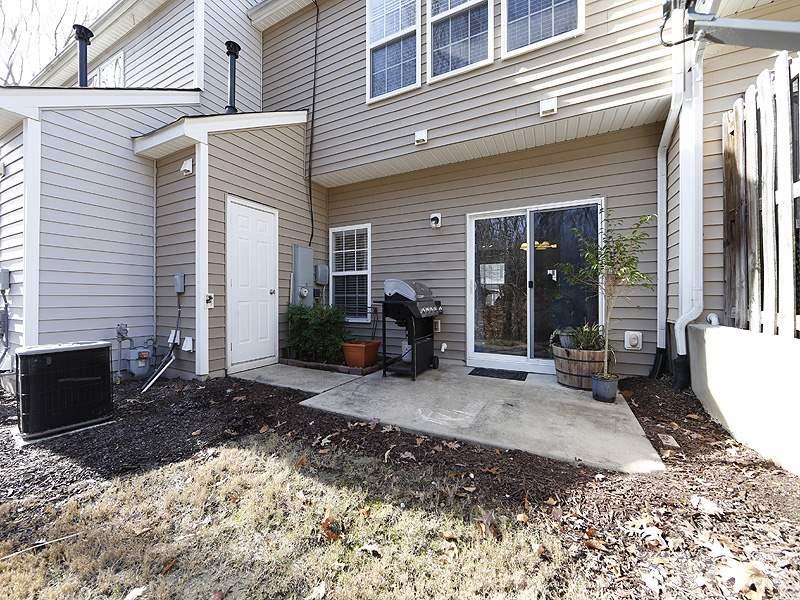 8210 Clasara Circle Raleigh, NC 27613 - Photo 2 of 14 a view of a house with backyard of house and sitting area