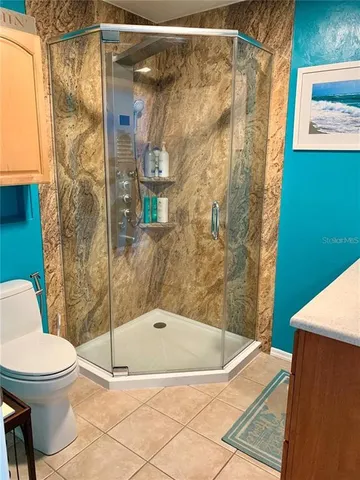 a view of dinning table and chairs in patio