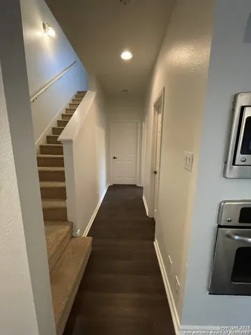 a view of a hallway with entryway