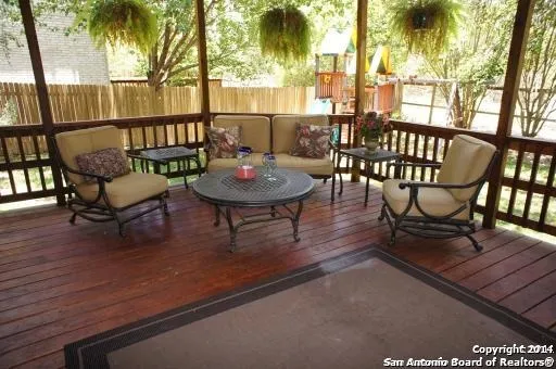 a view of a chairs on the roof deck