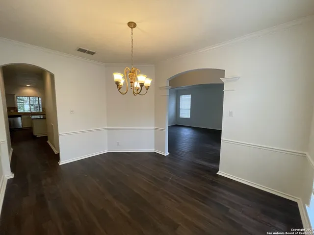 a view of a livingroom with wooden floor